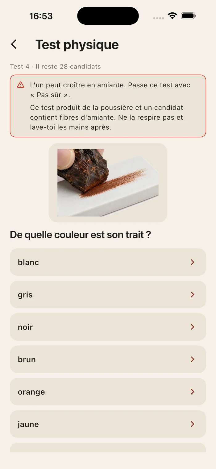 Une question sur le test du trait, surmontée d'un avertissement : un candidat restant peut croître en amiante et le test produit de la poussière